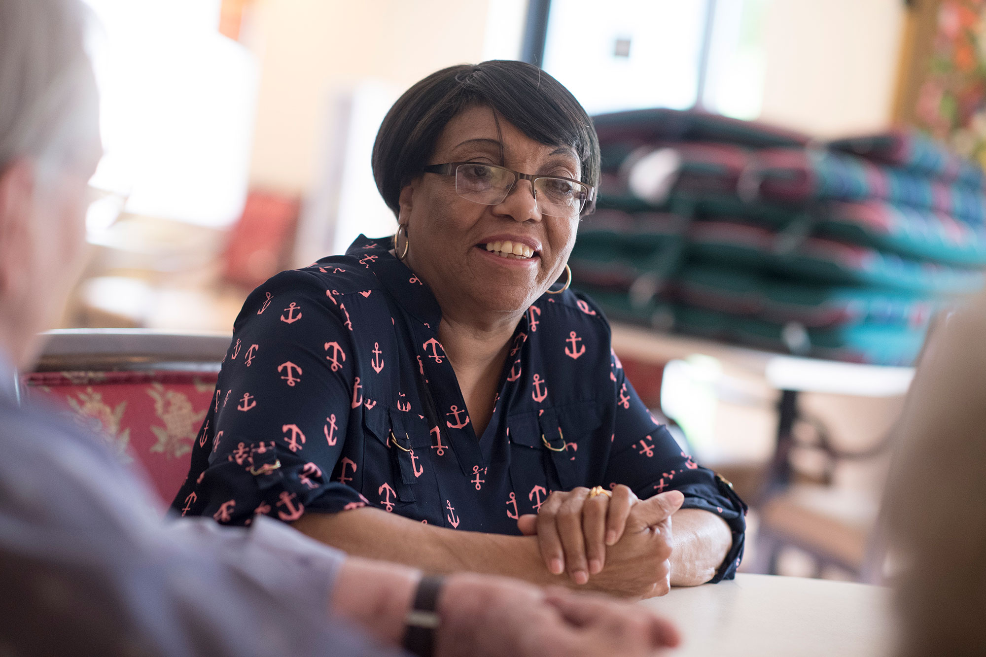 Woman in glasses smiling close up