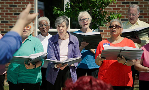 Women singing outside